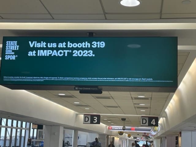 You know it’s a major conference when exhibitors start to grab your attention as soon as you land at the airport. 